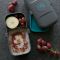 Dwupoziomowy lunchbox z 4 przegródkami i sztućcami w zestawie - Eseasons Dark Grey Orange 1,2 l